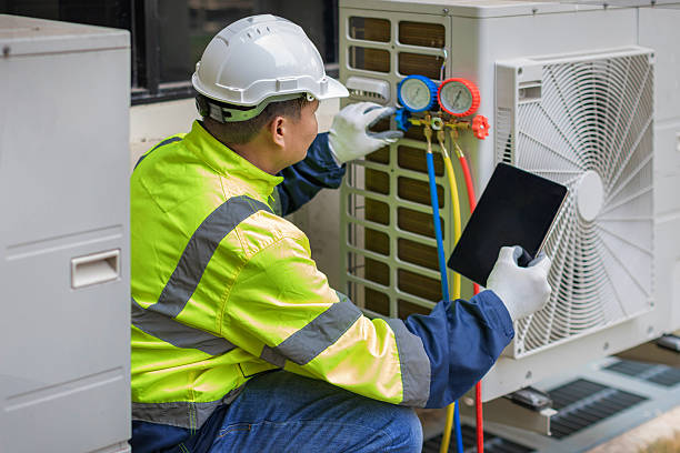 Professional Heat Pump Repair technician working in Ionia, MI
